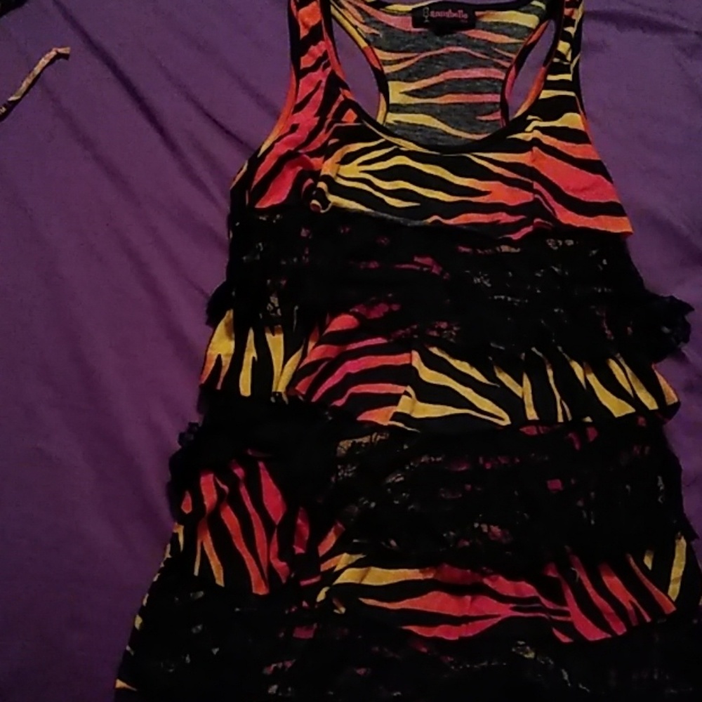 Its a animal print ruffle annabelle top